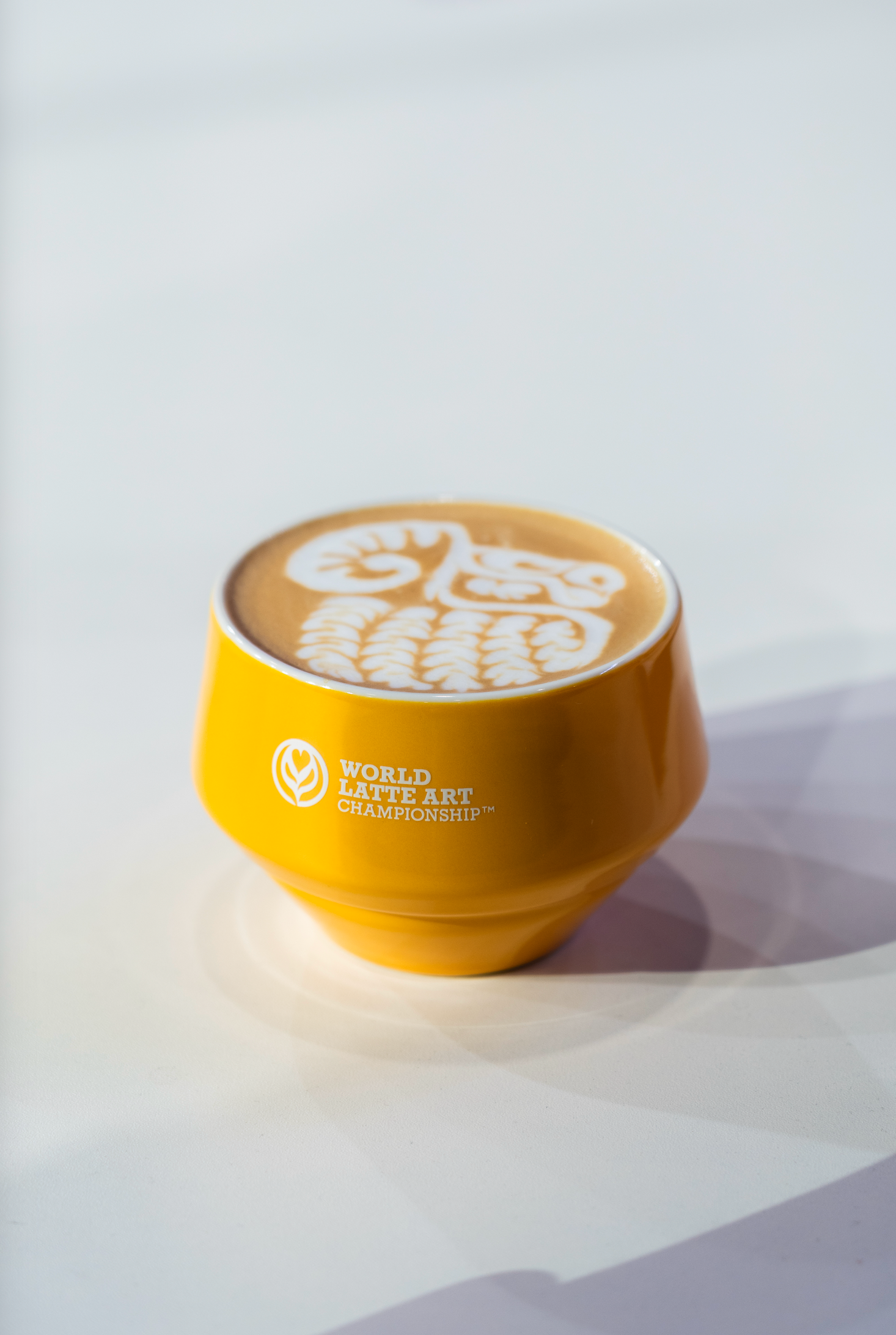 1 x Maniko Milk Cup with Saucer - WLAC Geneve 2025 Official Mug
